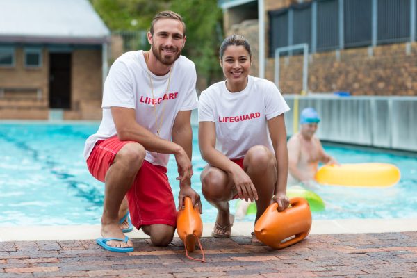 portrait-of-male-and-female-lifeguards-holding-res-2025-10-28-21-50-48-utc